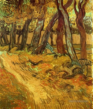 L’hôpital du jardin de Saint Paul avec la figure Vincent van Gogh Peinture à l'huile